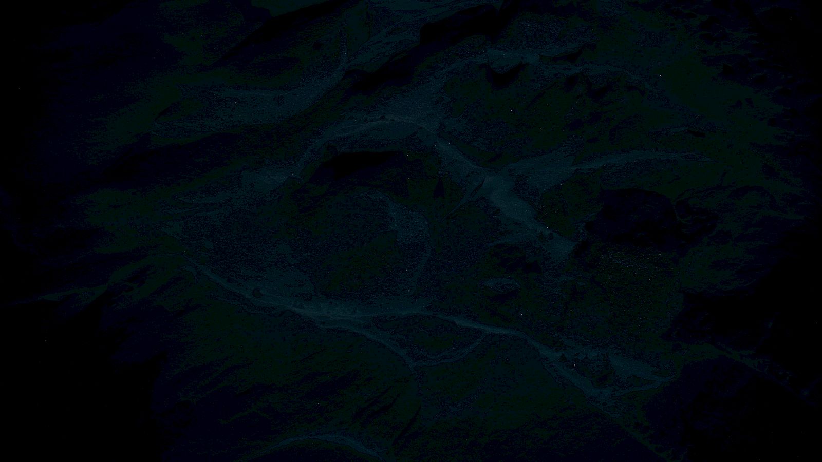 The image is too dark to clearly identify anything specific.